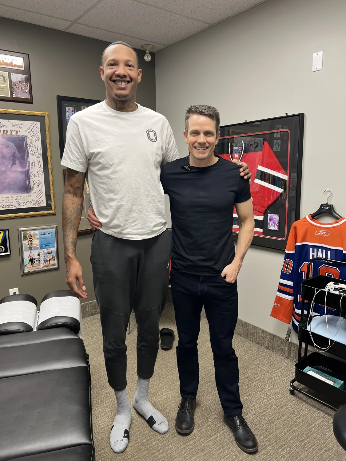 Dr. Todd poses for a photograph with a patient